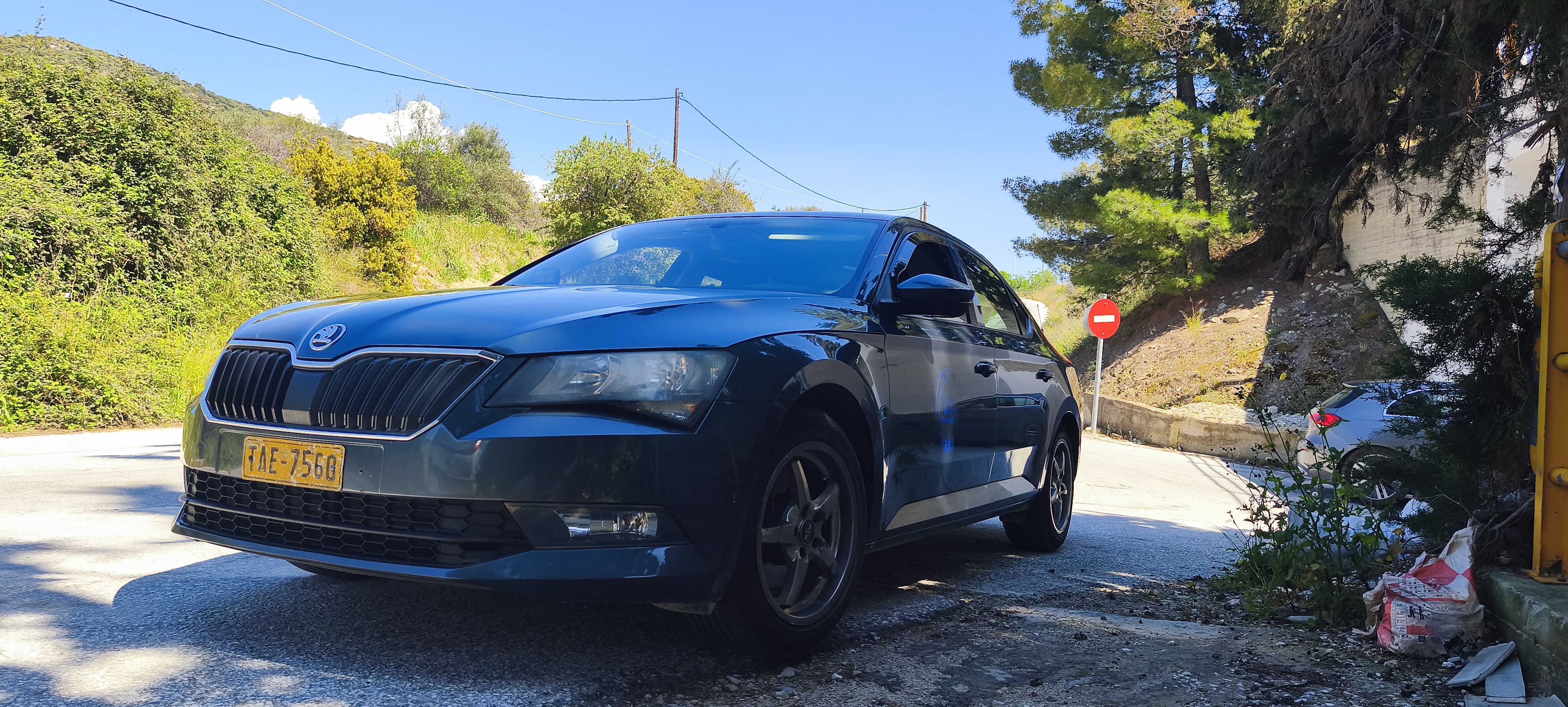 Silver modern taxi car in Volos - Greece ready for passenger transfer from a closer look
