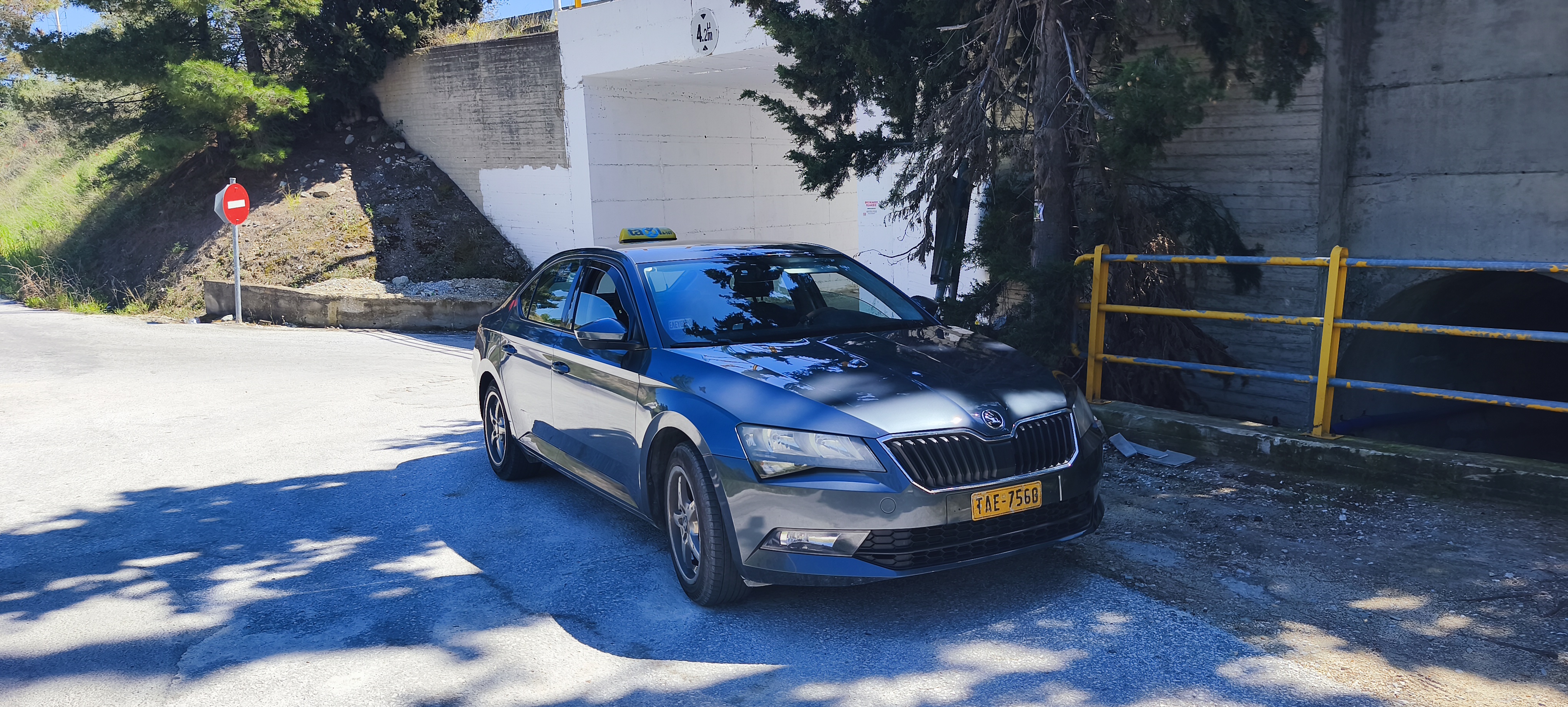 Silver modern taxi car in Volos - Greece ready for passenger transfer